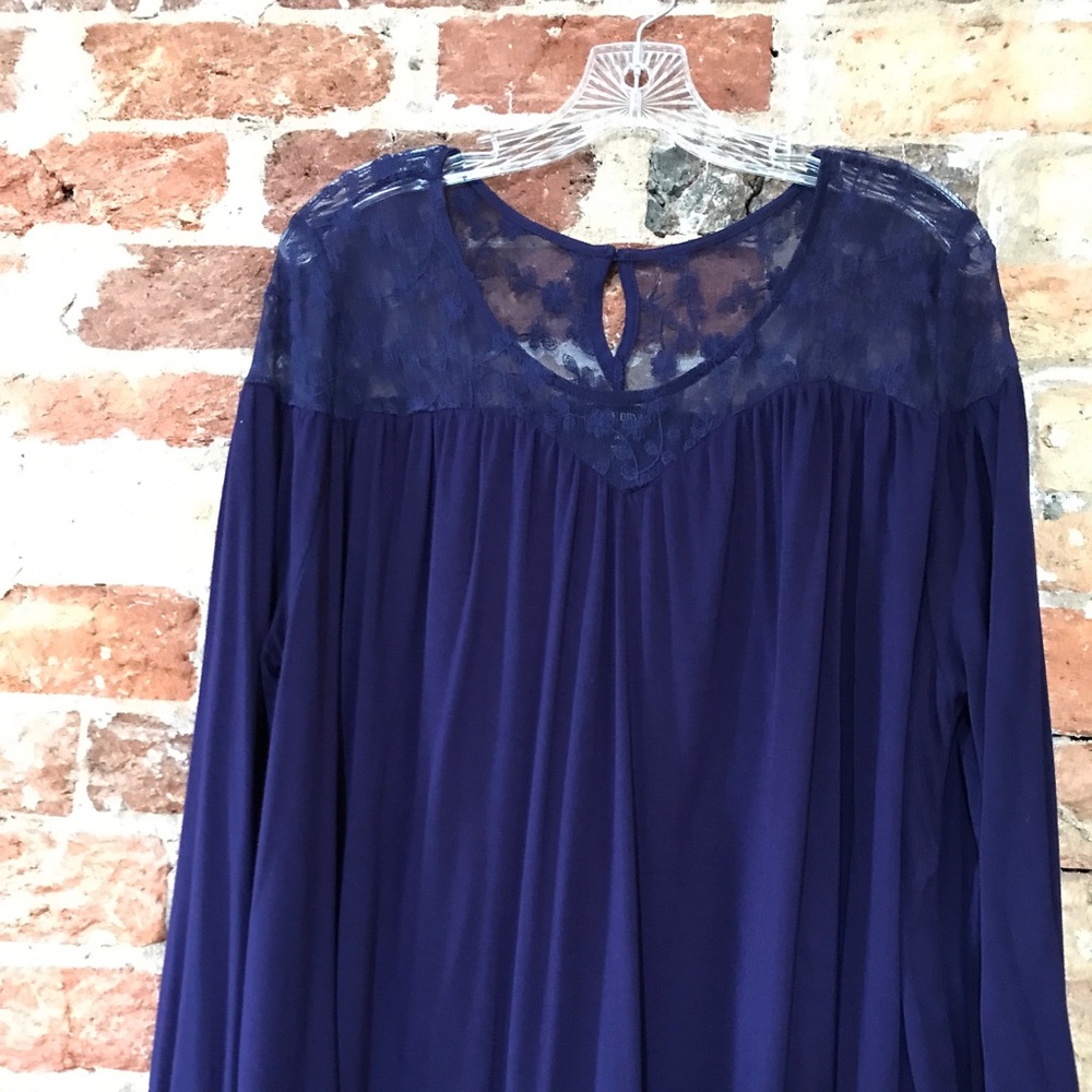 Loose, flowing deep purple top